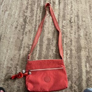 Kipling Coral Red Crossbody Bag with Monkey Charm